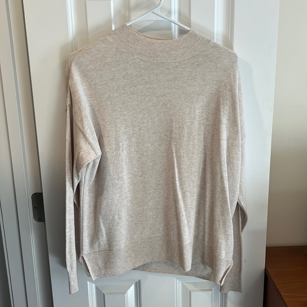 Cream high neck sweater